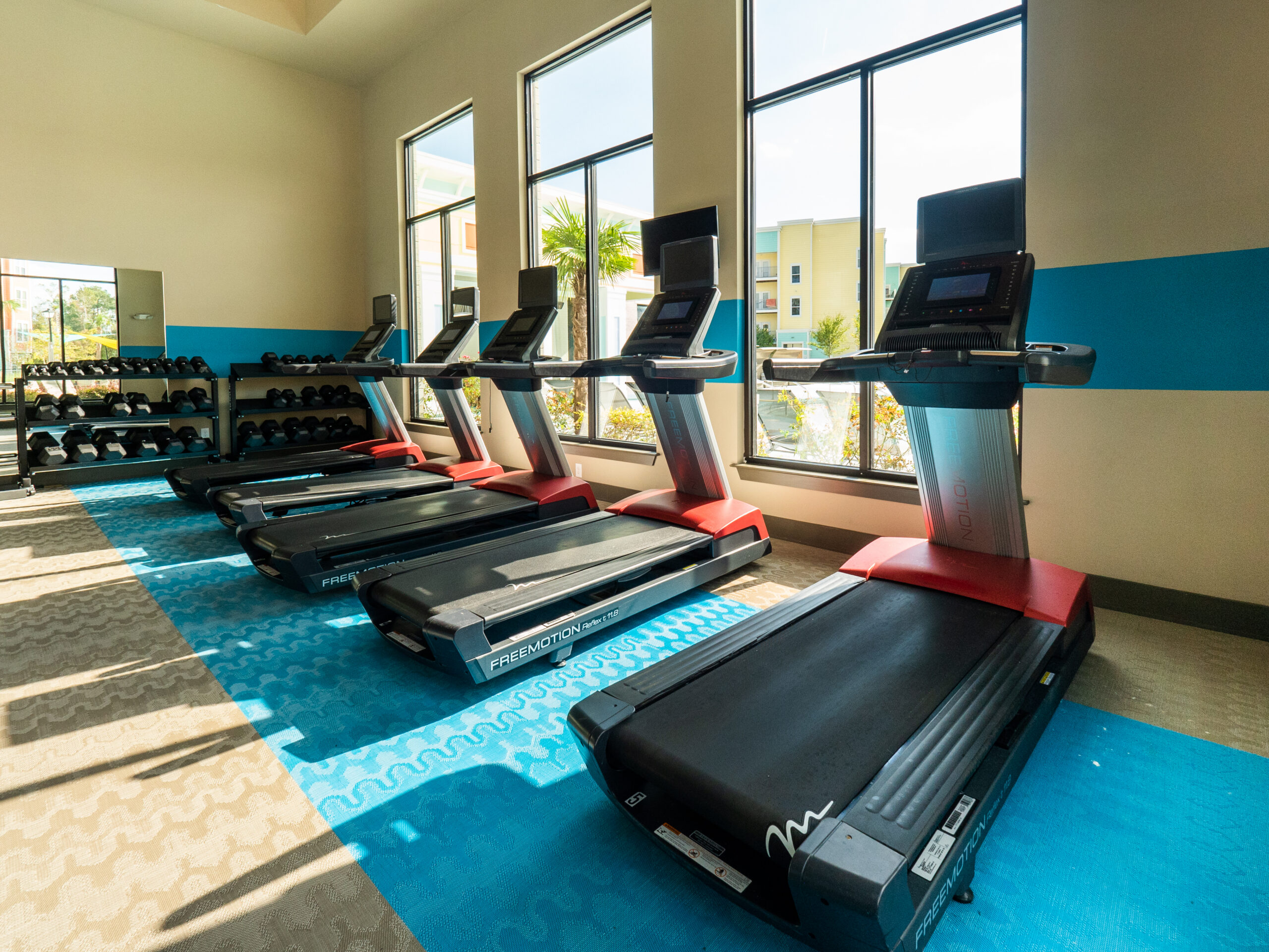 treadmill area at Progress 910, apartments near UNCW campus