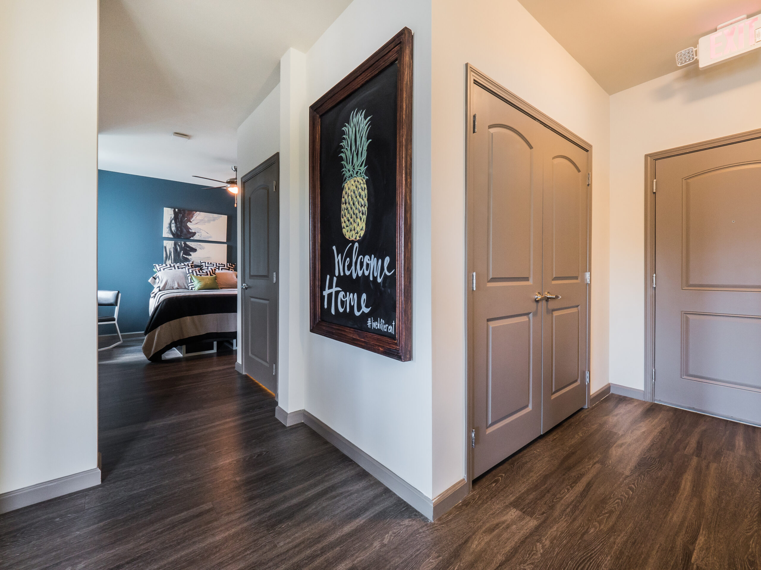 Entryway and hallway at Progress 910, student apartments Wilmington, NC.